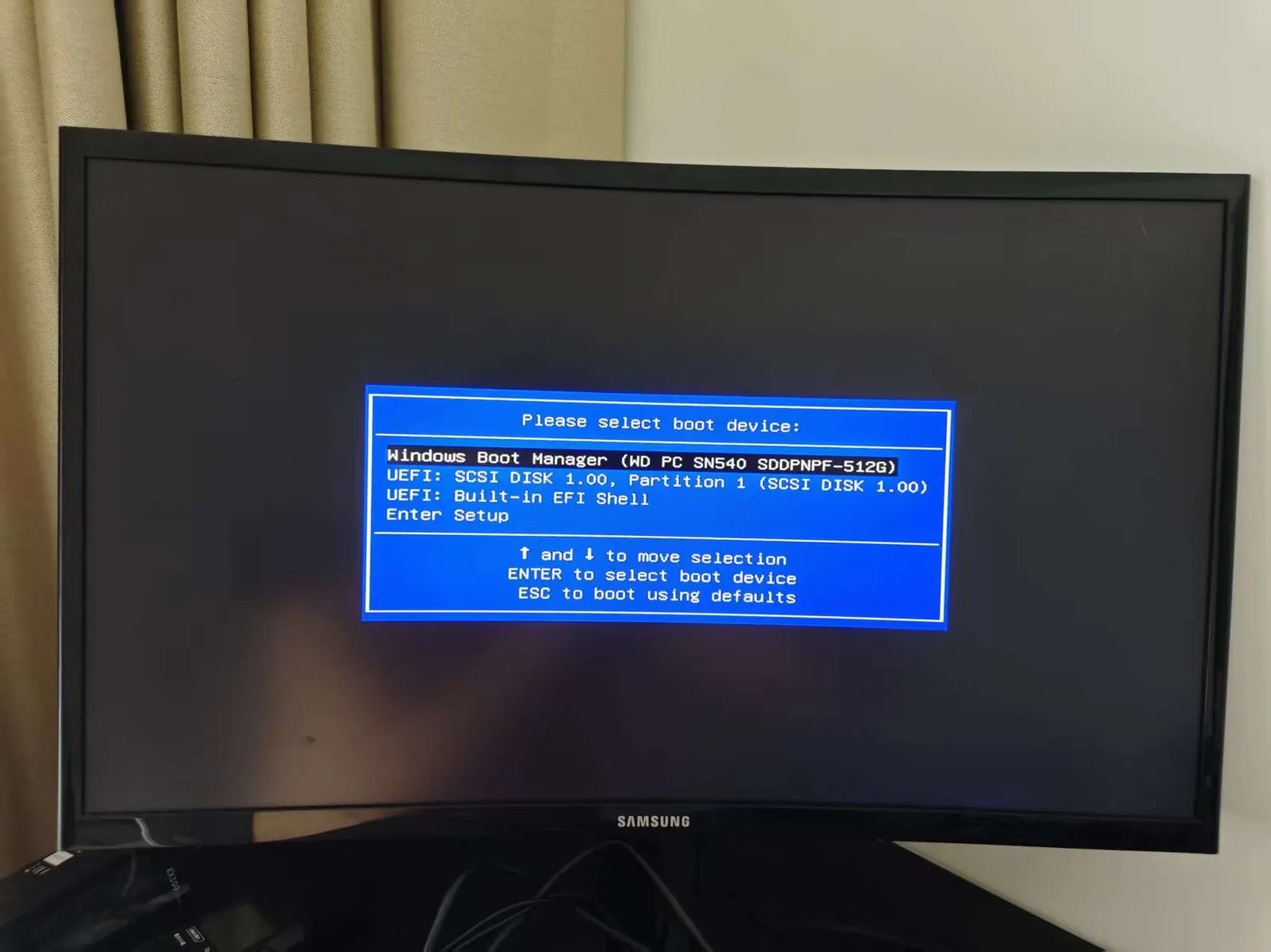 UEFI boot menu on the Beelink EQi12 showing the Ubuntu 26.04 USB stick as a boot option