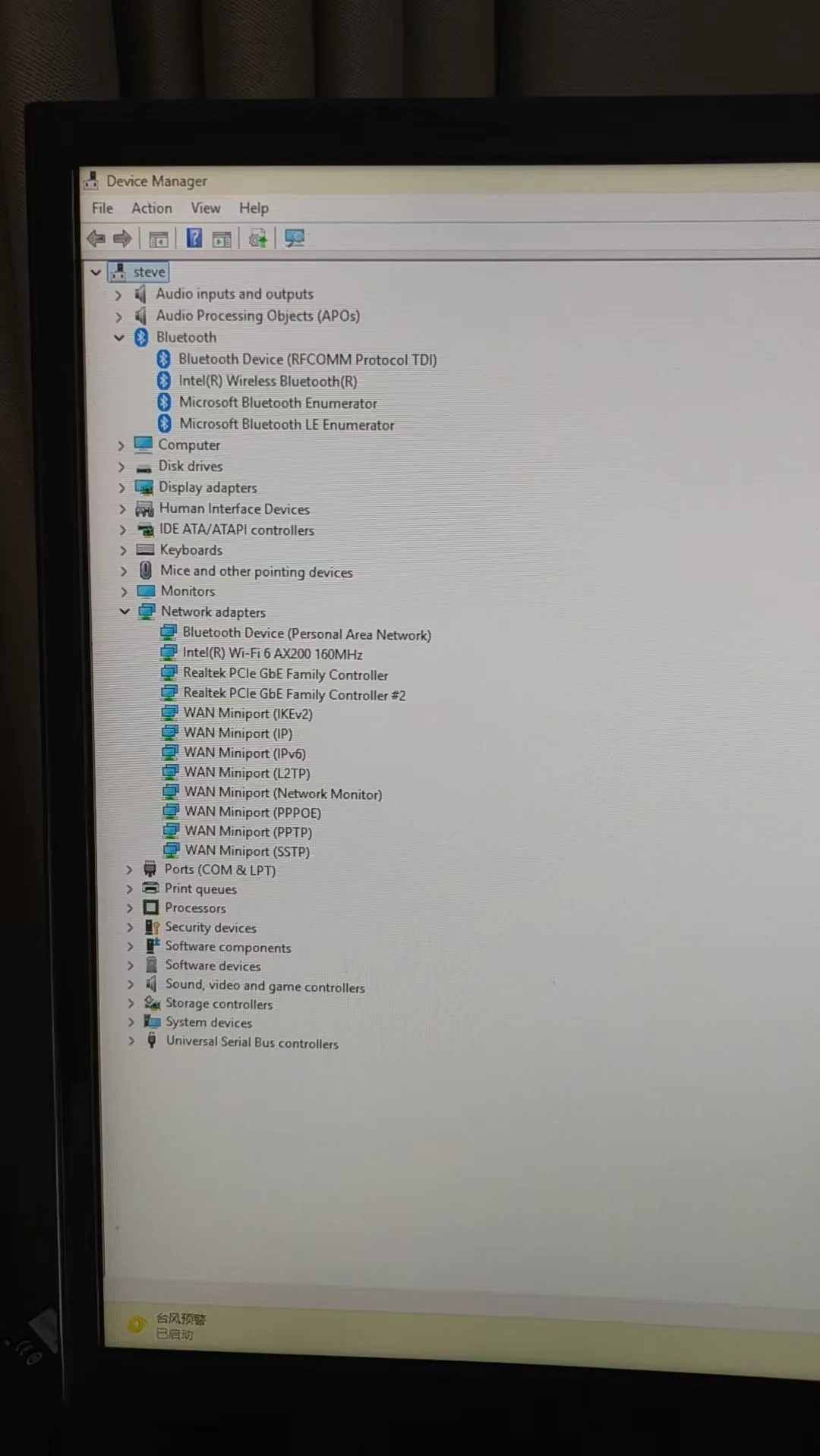 Windows Device Manager listing the active Realtek PCIe GbE controller on the EQi12